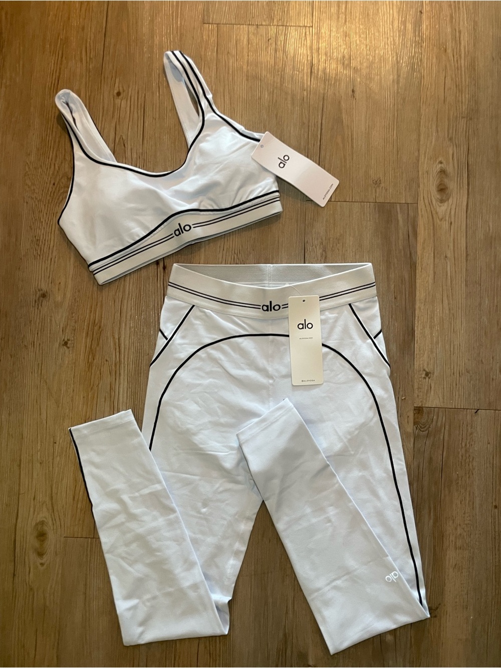 ALO Yoga White Leggings and Sports Bra Set with Black Piping
